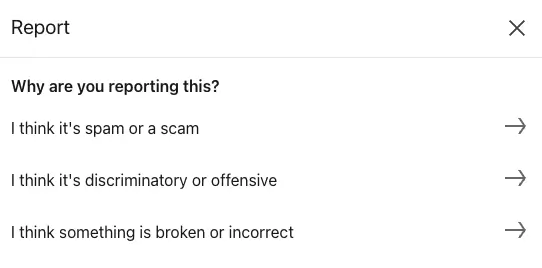 LinkedIn reporting menu with options to flag content as spam, discriminatory, offensive, or broken.